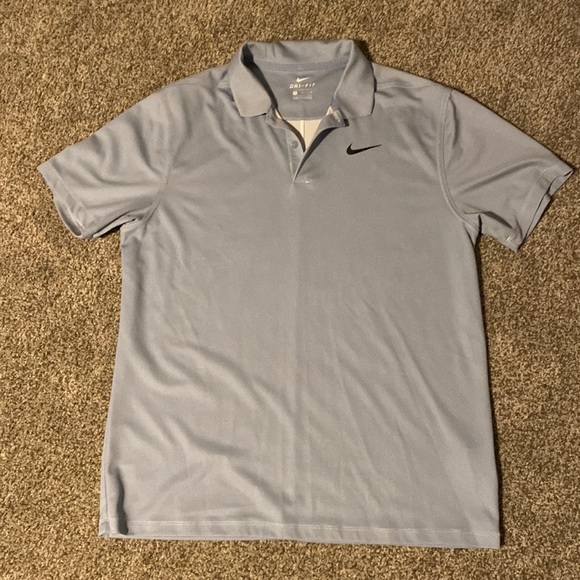 Medium light blue Nike golf shirt. - Picture 1 of 1